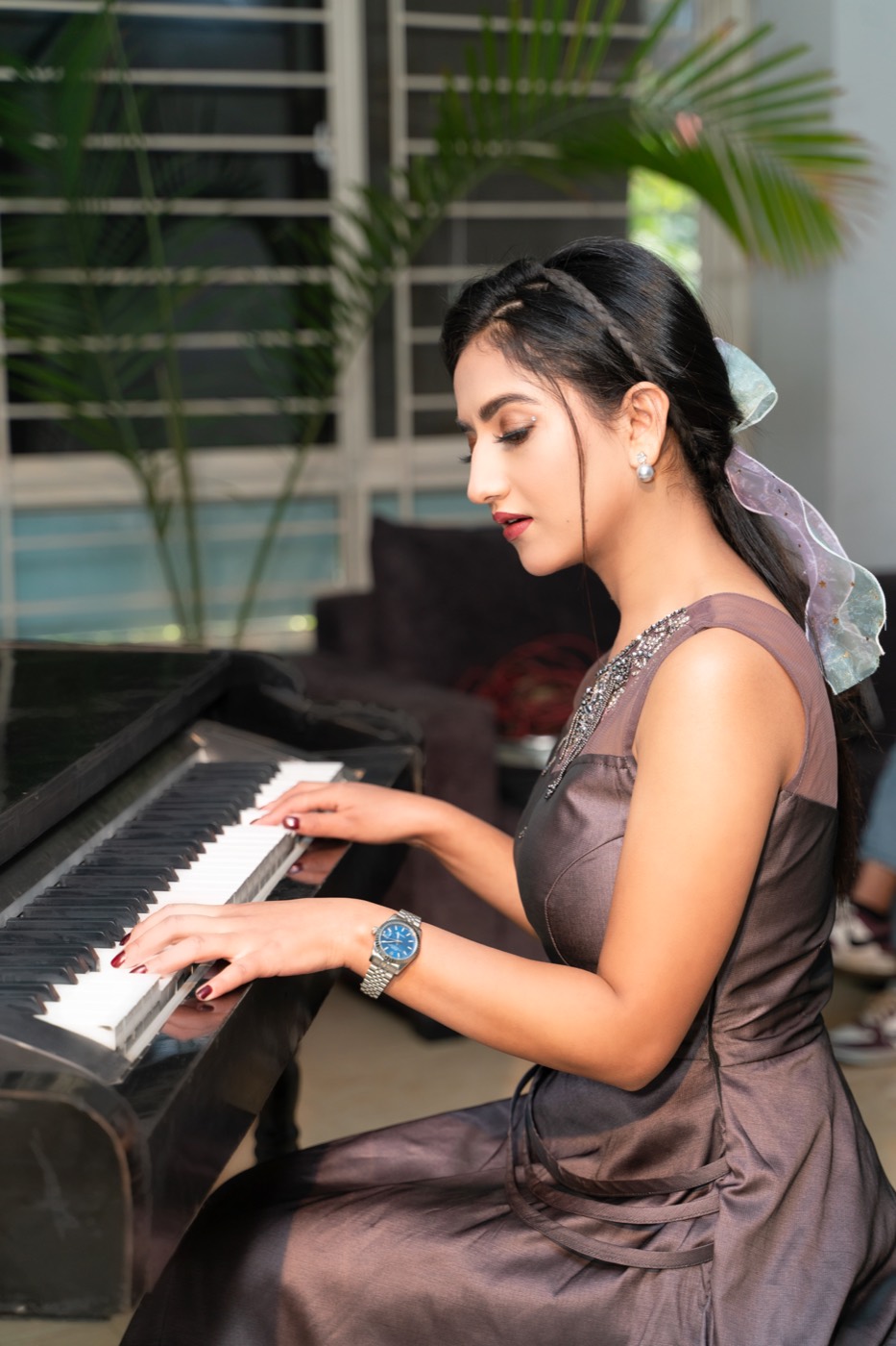 Alka Subedi playing a keyboard