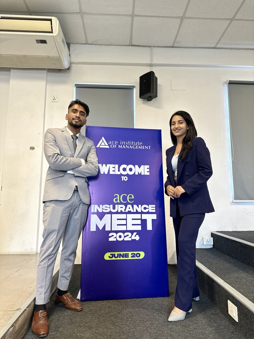 Alka Subedi with her co-moderator at the Ace Insurance Meet 2024 banner