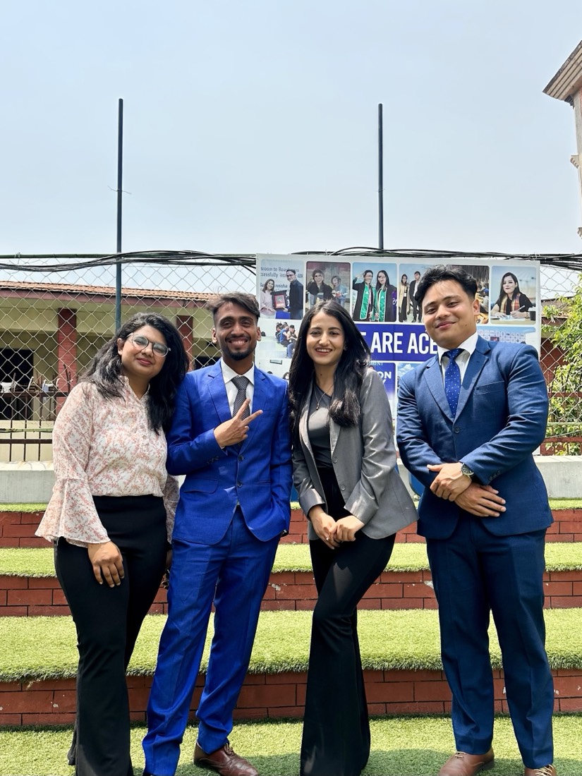 Alka Subedi with three teammates outside Ace Institute of Management